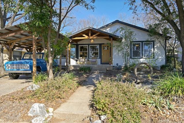 bungalow-style home with covered porch