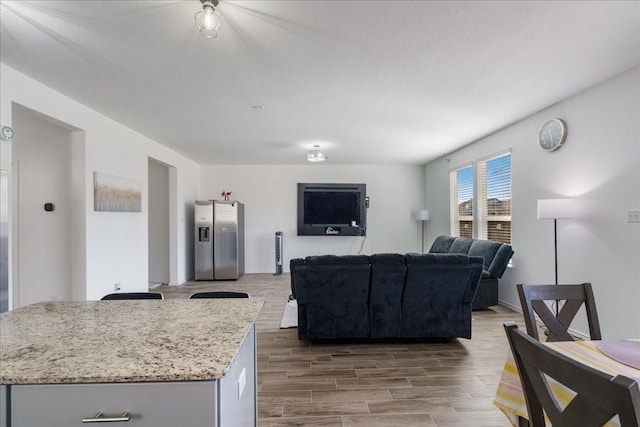 living room with hardwood / wood-style floors