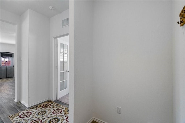 hall featuring light hardwood / wood-style floors