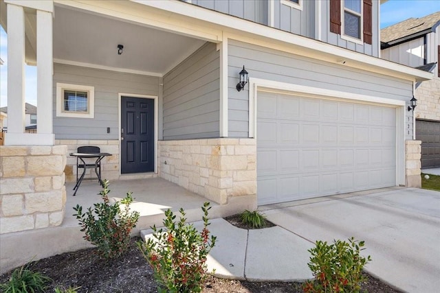 entrance to property featuring a garage