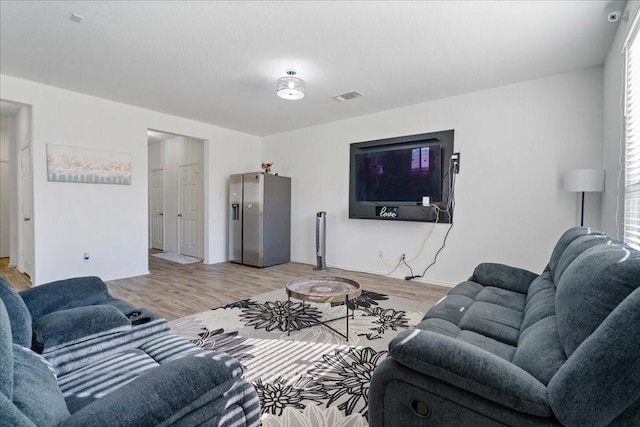 living room featuring light wood-type flooring