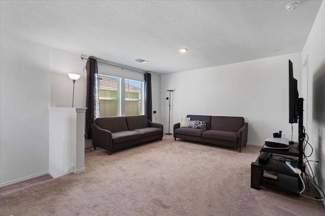 living room with light colored carpet