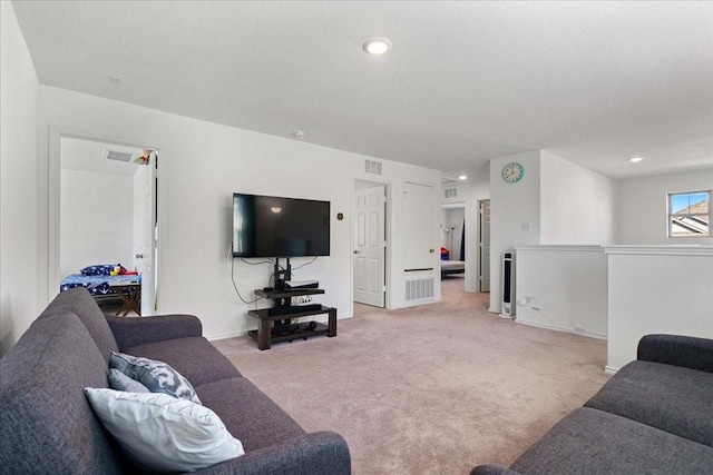 living room featuring light colored carpet