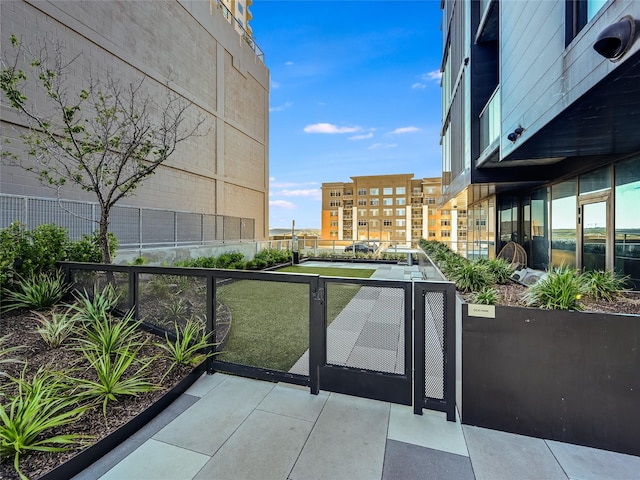 exterior space featuring tennis court