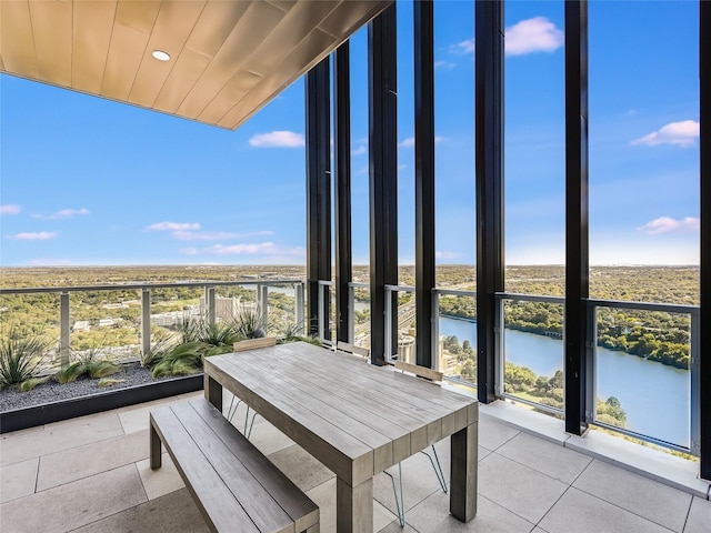 balcony featuring a water view