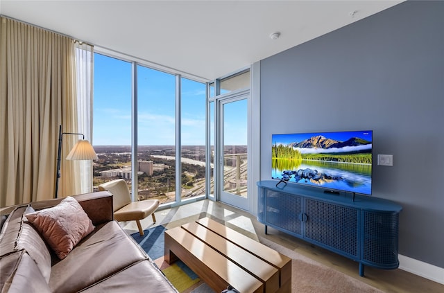 living room featuring a wall of windows