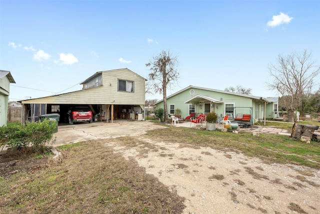 view of front of house with a carport