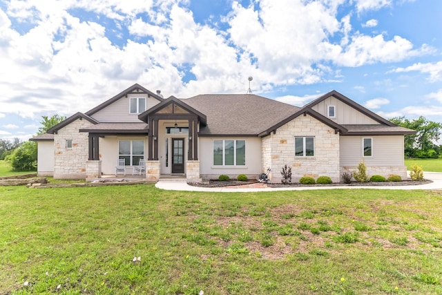 craftsman inspired home with a front yard