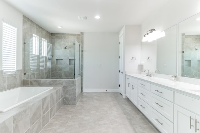 bathroom with vanity, tile patterned flooring, and independent shower and bath