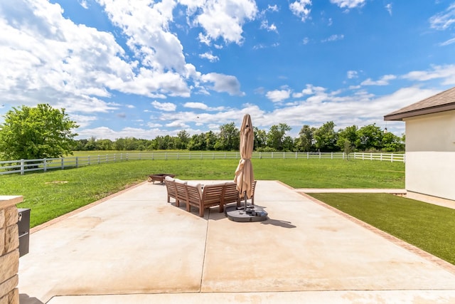 view of patio / terrace featuring a rural view and an outdoor living space