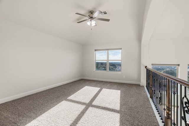 carpeted empty room with ceiling fan