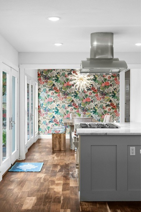 kitchen featuring dark hardwood / wood-style flooring, island range hood, and gray cabinets