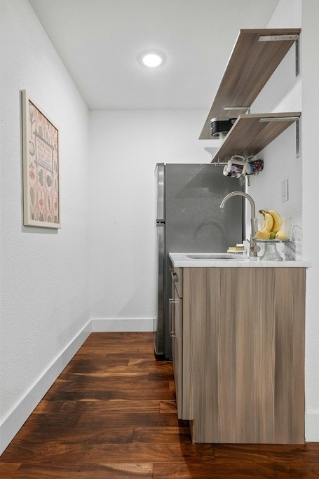 kitchen featuring dark hardwood / wood-style floors