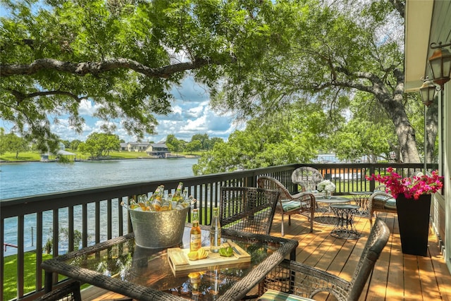 deck featuring a water view