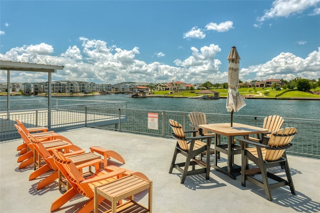 view of patio / terrace with a water view