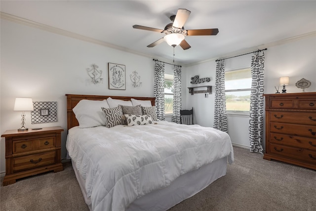 bedroom featuring ceiling fan, crown molding, multiple windows, and dark carpet