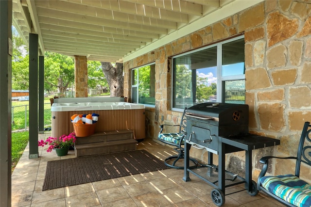 view of patio featuring a hot tub