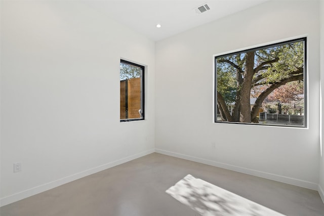 empty room featuring concrete floors