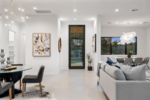 2512 Ridgeview St, Austin, TX 78704 - dining area featuring concrete flooring, recessed lighting, and a chandelier
