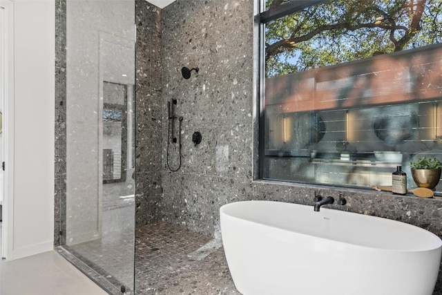2512 Ridgeview St, Austin, TX 78704 - bathroom with a freestanding tub and tiled shower