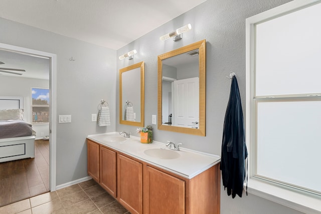 bathroom with vanity and tile patterned floors