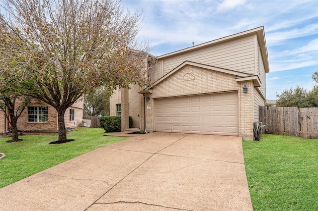 view of front of house with a front lawn and a garage