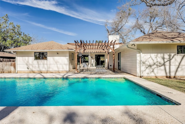 view of swimming pool featuring a pergola and a patio