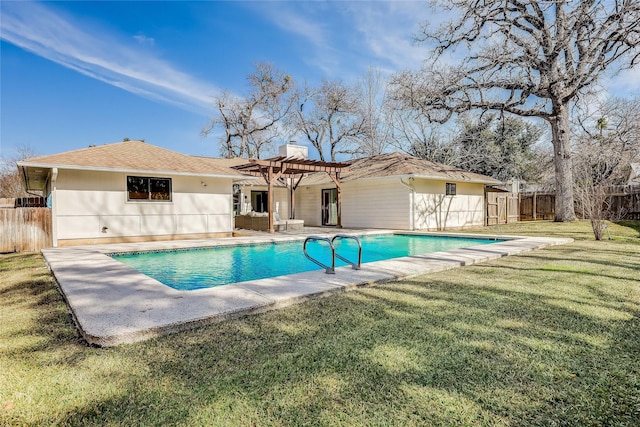 view of swimming pool featuring a lawn, a pergola, and a patio