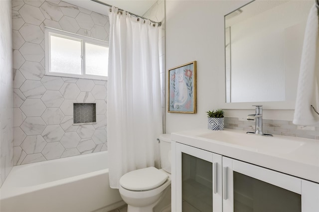 full bathroom featuring vanity, shower / tub combo with curtain, tasteful backsplash, and toilet