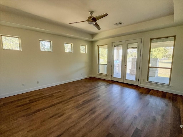 312 Brave Face St, Leander, TX 78641 - empty room with french doors, dark wood-style flooring, and ceiling fan