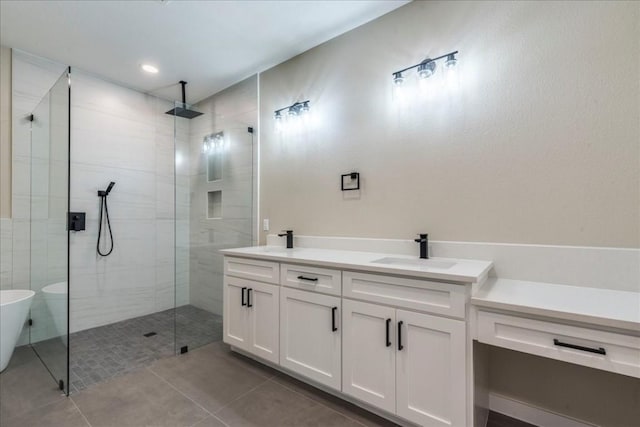 bathroom featuring independent shower and bath, vanity, and tile patterned floors