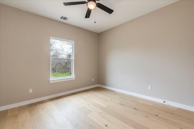 unfurnished room with ceiling fan and light hardwood / wood-style floors