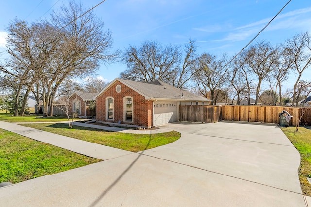 view of side of home featuring a lawn and a garage