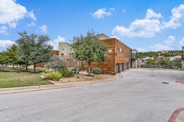 view of side of property with a garage