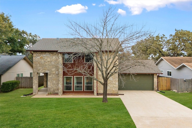 view of front of home featuring a front yard and a garage