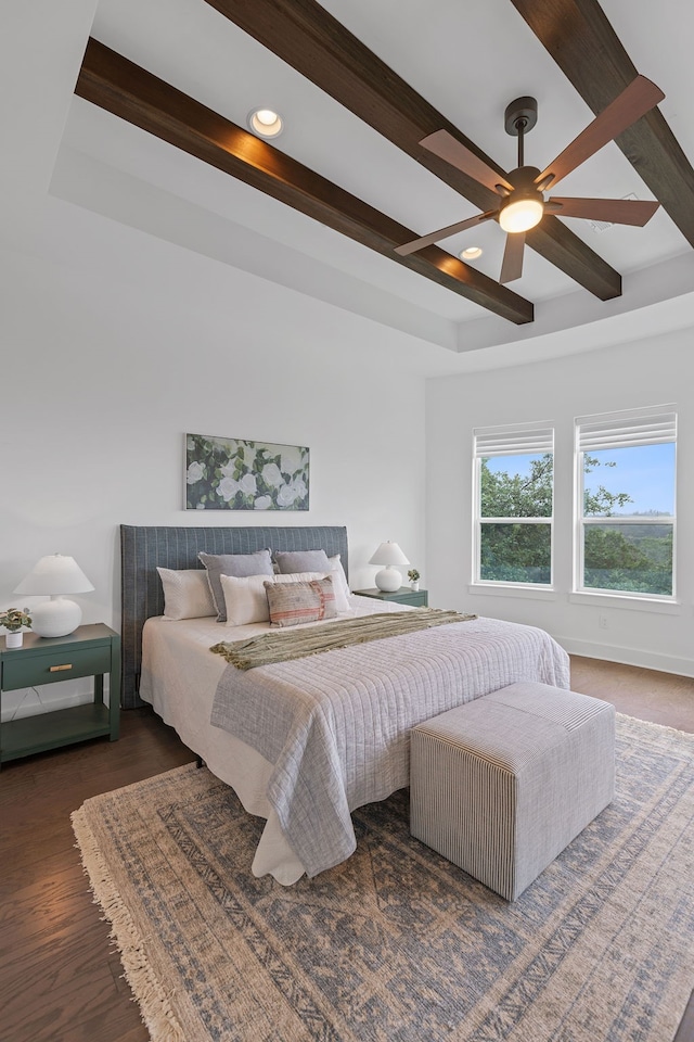 bedroom featuring beamed ceiling, ceiling fan, and dark hardwood / wood-style floors