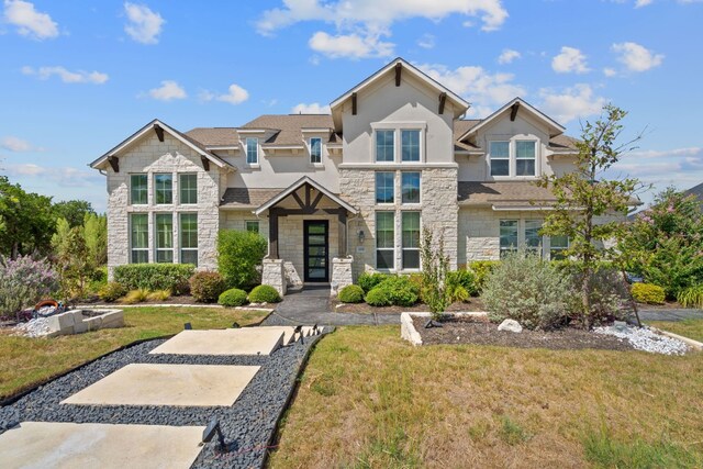 view of front of property with a front lawn