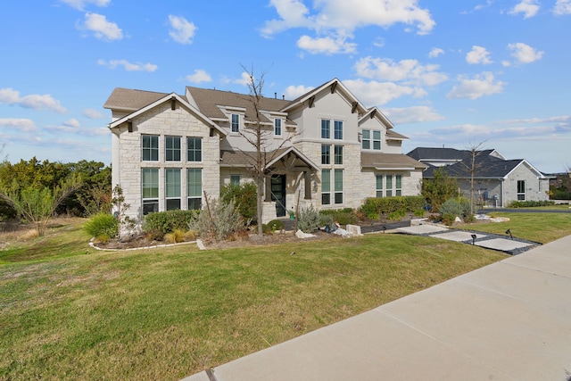 view of front of house with a front lawn