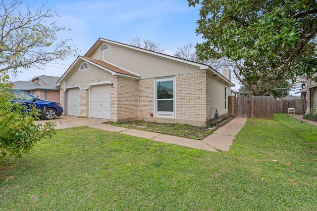 view of front facade featuring a front lawn and a garage