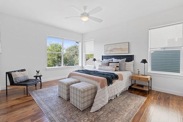 bedroom featuring dark wood-type flooring and ceiling fan