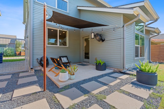 back of house with a patio area