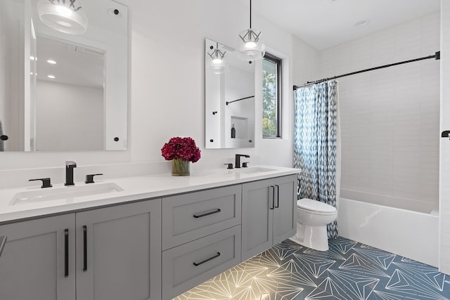 full bathroom featuring double vanity, a sink, toilet, and shower / bathtub combination with curtain