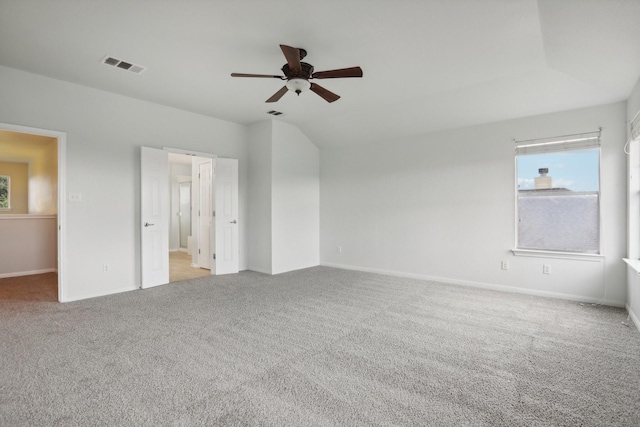 unfurnished bedroom featuring ceiling fan and light colored carpet