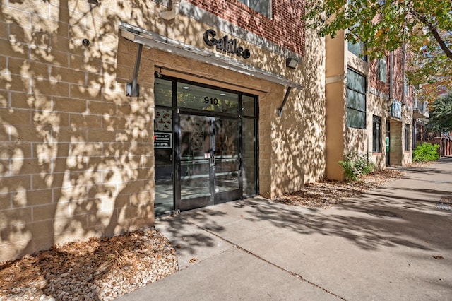 entrance to property featuring french doors