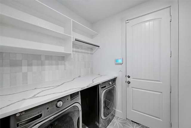 laundry room with separate washer and dryer