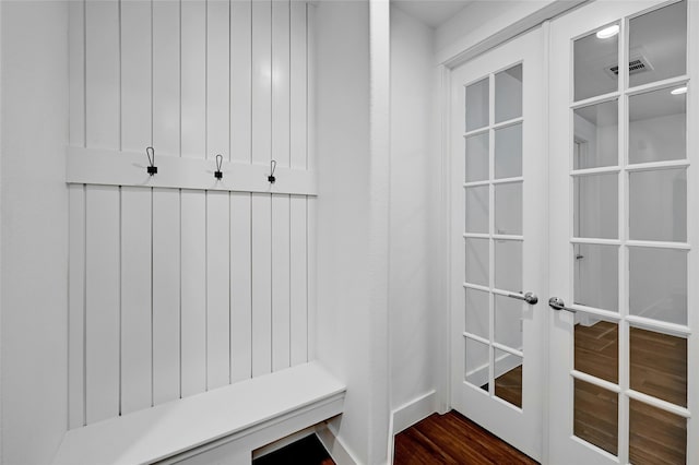 mudroom with french doors and dark hardwood / wood-style floors