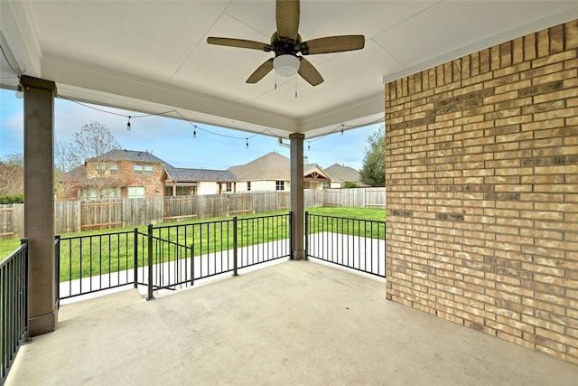 view of patio featuring ceiling fan