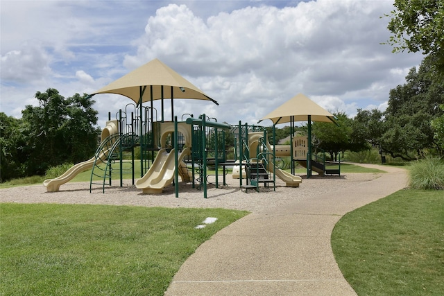 view of play area featuring a lawn