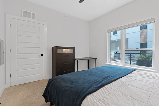 carpeted bedroom with ceiling fan