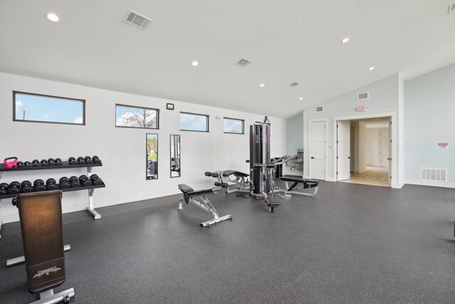 workout area with vaulted ceiling